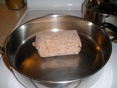 Frozen block of sausage